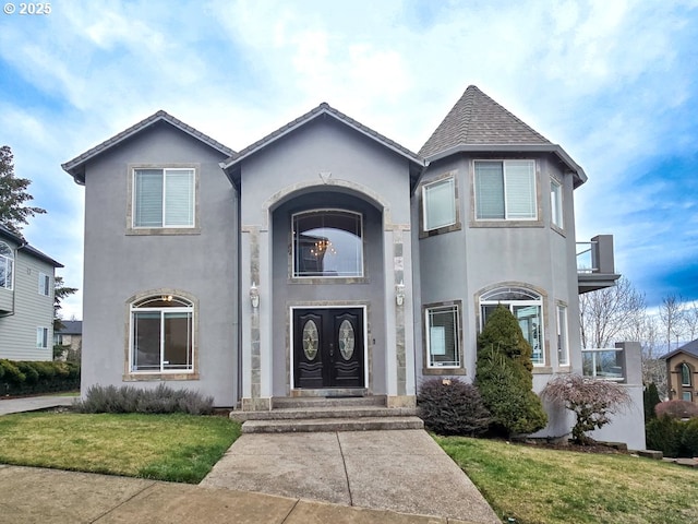 view of front of home with a front yard