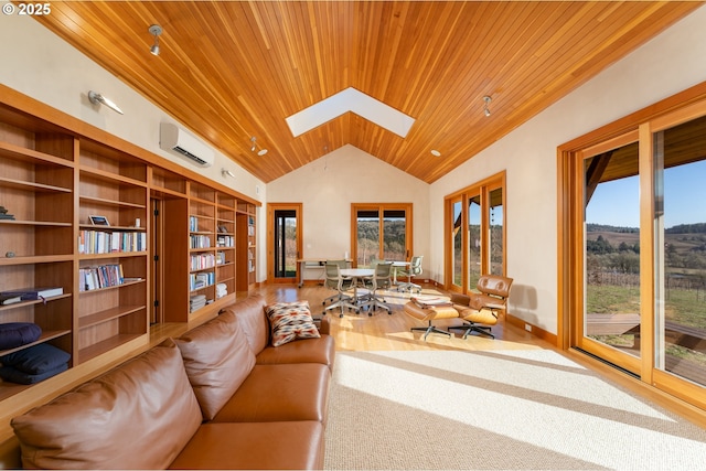 carpeted living room with wood ceiling, built in shelves, a skylight, a wall unit AC, and high vaulted ceiling