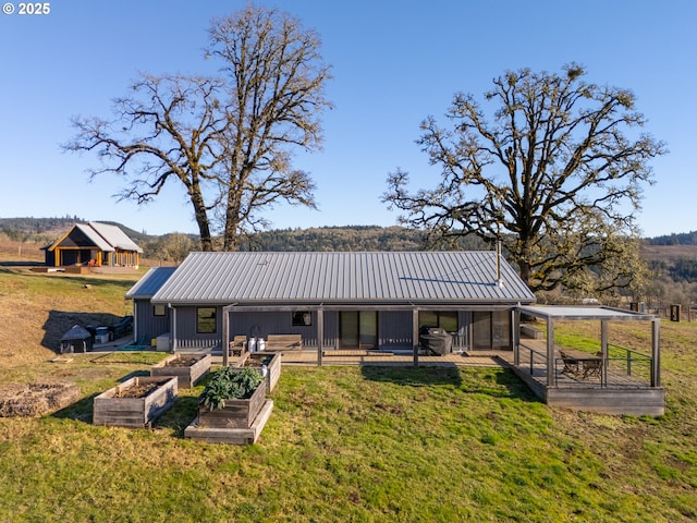 back of house with a yard