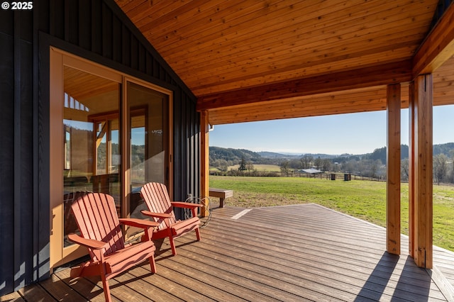 deck with a mountain view and a rural view