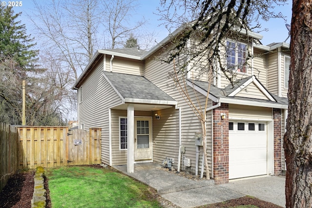 view of front of property with a garage, a shingled roof, fence, and brick siding