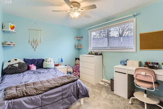 bedroom with light colored carpet and ceiling fan