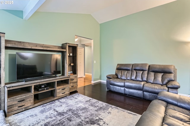 living room with wood finished floors, baseboards, and vaulted ceiling