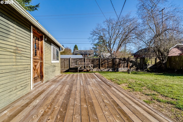 deck featuring a yard