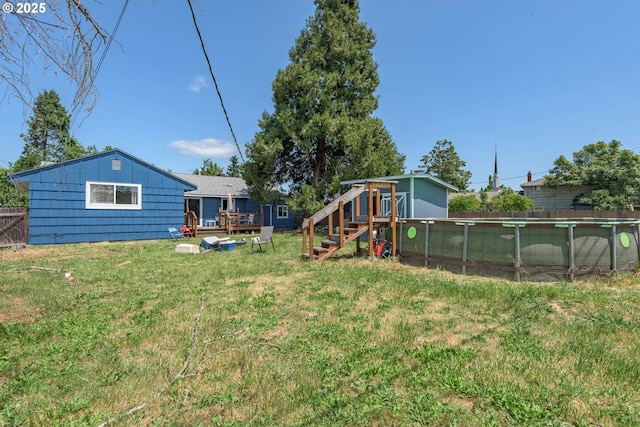 1453 N St, Springfield, OR 97477 - view of yard featuring a deck and stairs