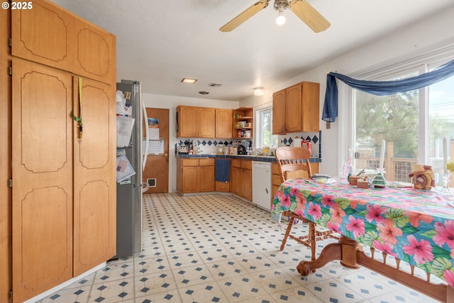 1453 N St, Springfield, OR 97477 - kitchen featuring open shelves, light flooring, dishwasher, a ceiling fan, and brown cabinets