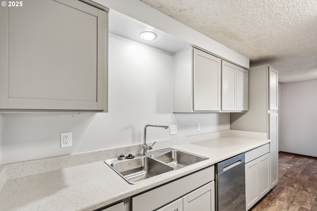 1885 N Danebo Ave, Eugene, OR 97402 - kitchen featuring dishwasher, a sink, a textured ceiling, light countertops, and white cabinets