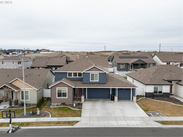 view of front of home featuring fence, roof with shingles, concrete driveway, central air condition unit, and a residential view