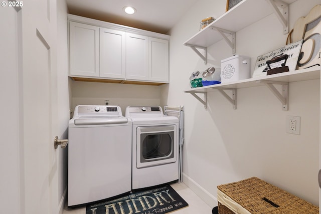 clothes washing area with cabinet space, recessed lighting, washer and dryer, and baseboards