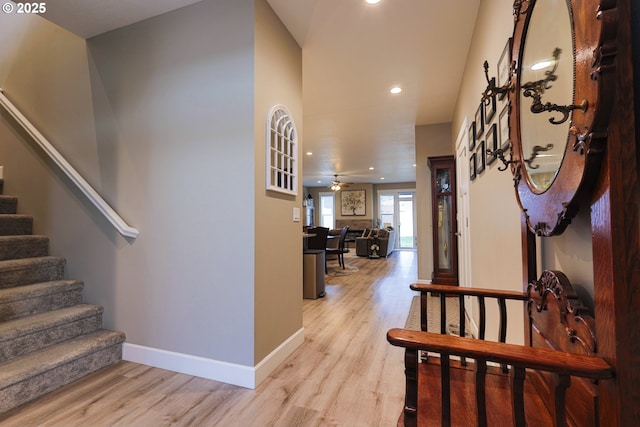 interior space featuring recessed lighting, baseboards, wood finished floors, and ceiling fan