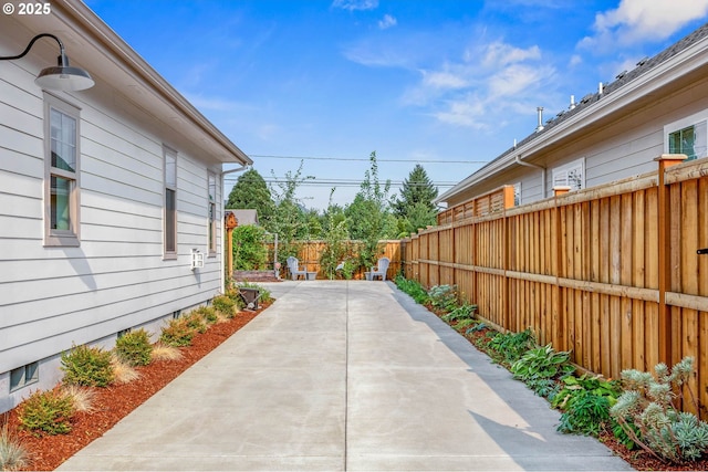 exterior space with a fenced backyard