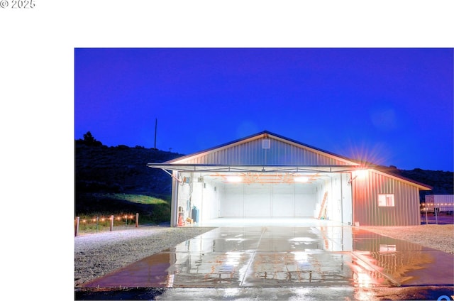 675 Peach Rd, Waterville, WA 98858 - view of front facade featuring a detached garage and concrete driveway