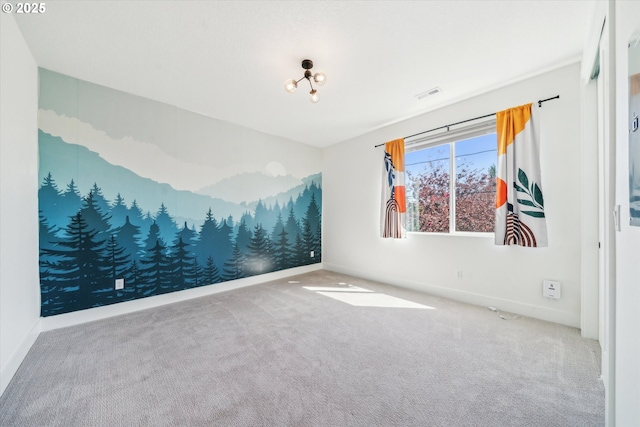 2585 SE 13th Ave, Portland, OR 97202 - carpeted spare room with visible vents and baseboards