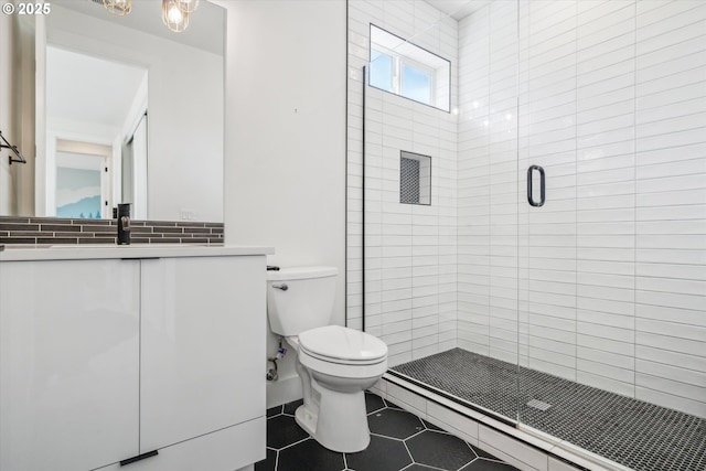 2585 SE 13th Ave, Portland, OR 97202 - full bath featuring toilet, vanity, tile patterned floors, and a stall shower