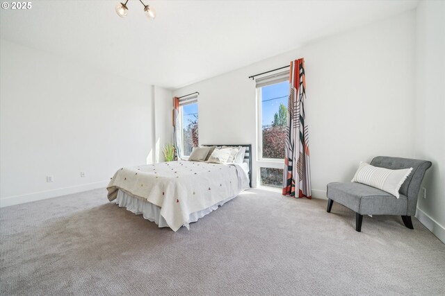 2585 SE 13th Ave, Portland, OR 97202 - bedroom featuring baseboards and carpet flooring