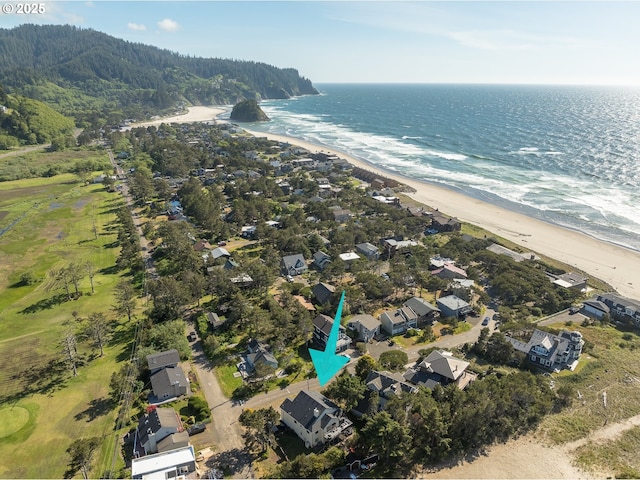 bird's eye view featuring a view of the beach and a water view