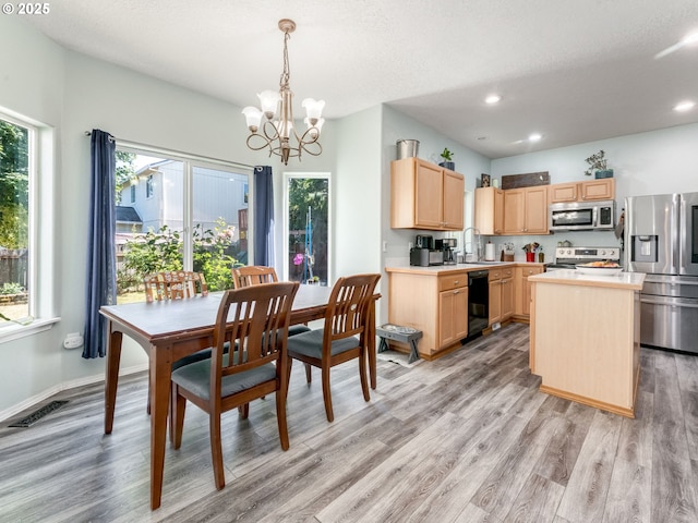 35530 Edies Way, Saint Helens, OR 97051 - dining area featuring a chandelier, light wood-style flooring, and recessed lighting
