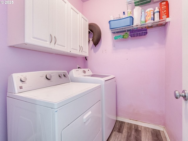 35530 Edies Way, Saint Helens, OR 97051 - washroom featuring washing machine and clothes dryer, wood finished floors, and cabinet space