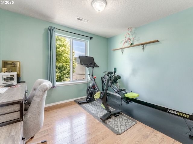 35530 Edies Way, Saint Helens, OR 97051 - workout area with a textured ceiling and wood finished floors