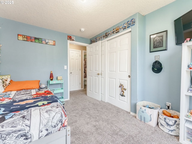 35530 Edies Way, Saint Helens, OR 97051 - carpeted bedroom with a closet and a textured ceiling