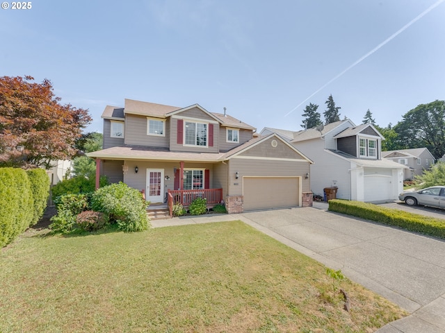 35530 Edies Way, Saint Helens, OR 97051 - view of front of home with covered porch, a front yard, driveway, and an attached garage