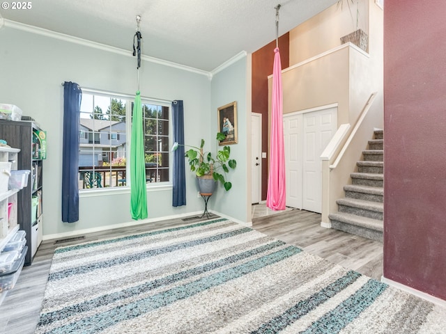 35530 Edies Way, Saint Helens, OR 97051 - foyer featuring crown molding, wood finished floors, and stairs