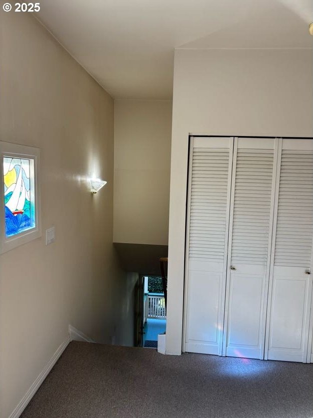 74 NE Sacramento St, Portland, OR 97213 - hallway with carpet flooring and plenty of natural light