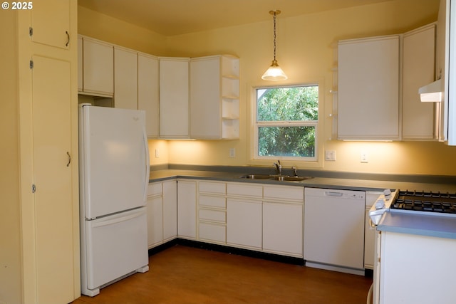 74 NE Sacramento St, Portland, OR 97213 - kitchen featuring white appliances, a sink, decorative light fixtures, range hood, and white cabinets