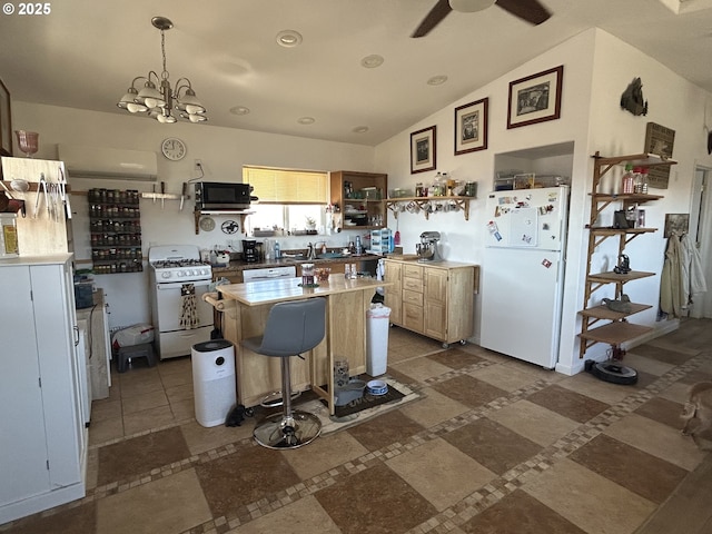 37102 Woods Ln, Richland, OR 97870 - kitchen with open shelves, white appliances, a kitchen island, and ceiling fan with notable chandelier