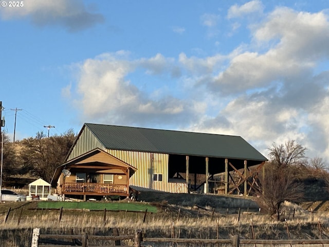 rear view of house with board and batten siding