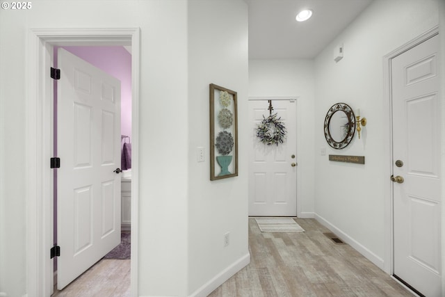 19774 SW Ashcroft Ln, Beaverton, OR 97003 - entryway with light wood-style flooring, baseboards, and recessed lighting