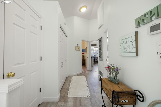 19774 SW Ashcroft Ln, Beaverton, OR 97003 - corridor featuring light wood-style flooring and baseboards