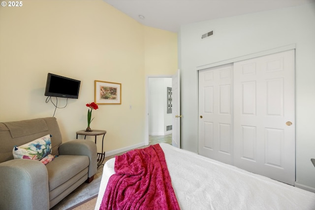 19774 SW Ashcroft Ln, Beaverton, OR 97003 - bedroom featuring a closet, high vaulted ceiling, and baseboards