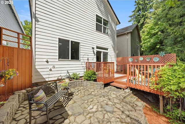 19774 SW Ashcroft Ln, Beaverton, OR 97003 - rear view of house with a deck and a patio area