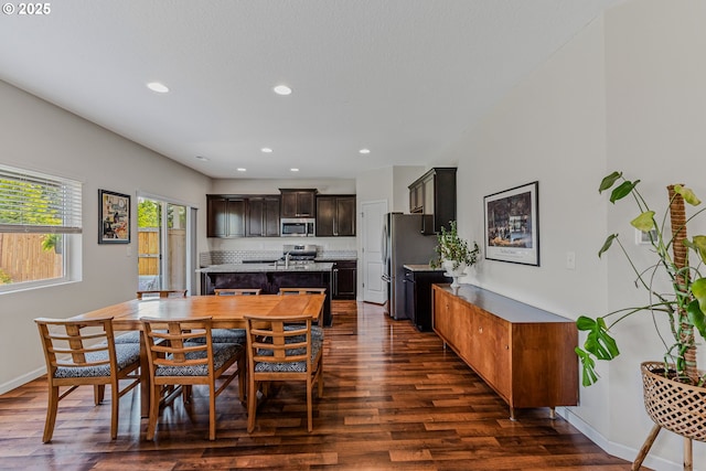 2908 S White Salmon Dr, Ridgefield, WA 98642 - dining space with dark wood-type flooring and recessed lighting