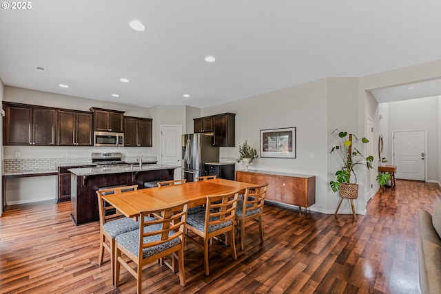 2908 S White Salmon Dr, Ridgefield, WA 98642 - dining area featuring wood finished floors and recessed lighting