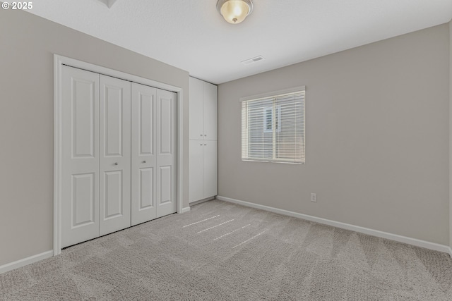 2908 S White Salmon Dr, Ridgefield, WA 98642 - unfurnished bedroom with light carpet and a closet