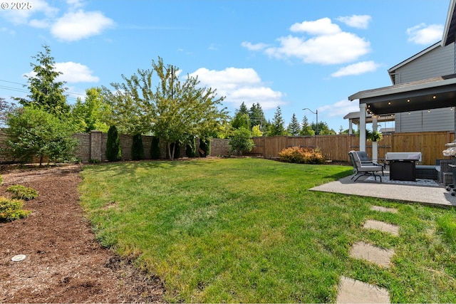 2908 S White Salmon Dr, Ridgefield, WA 98642 - fenced backyard with a patio area