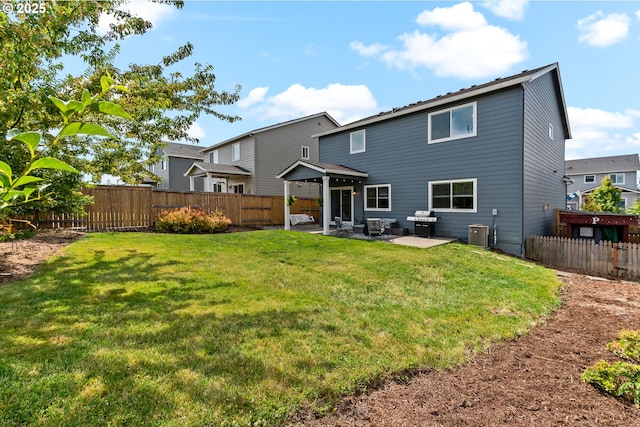 2908 S White Salmon Dr, Ridgefield, WA 98642 - rear view of property with a patio and a fenced backyard