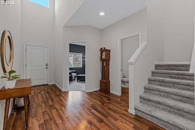 2908 S White Salmon Dr, Ridgefield, WA 98642 - entryway with stairway, dark wood-style flooring, a high ceiling, and recessed lighting