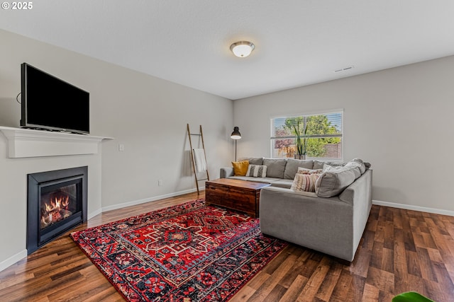 2908 S White Salmon Dr, Ridgefield, WA 98642 - living room with wood finished floors and a glass covered fireplace