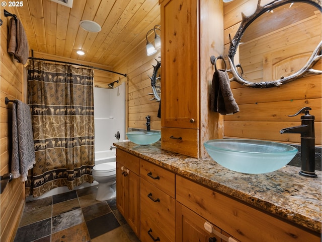 full bath featuring shower / bathtub combination with curtain, wooden ceiling, a sink, and wooden walls