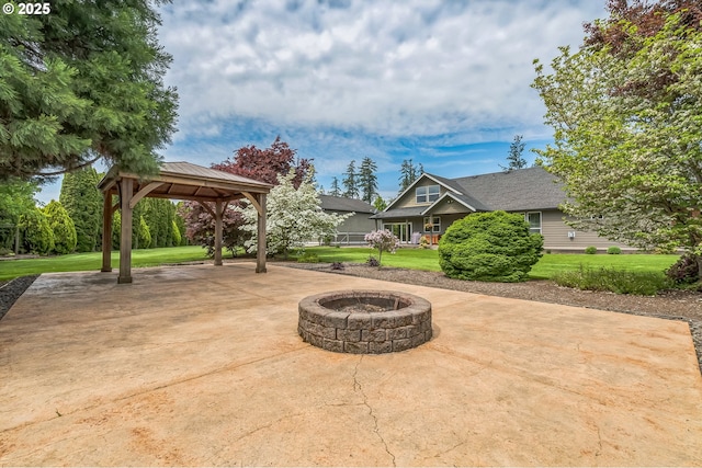 view of patio / terrace with a gazebo and an outdoor fire pit