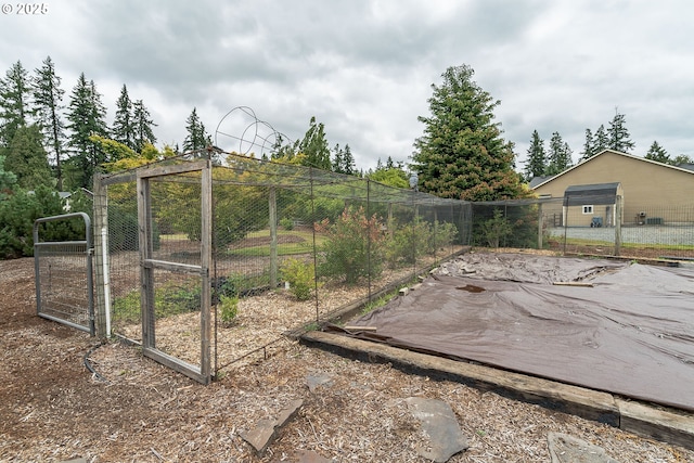 view of yard featuring a gate and fence