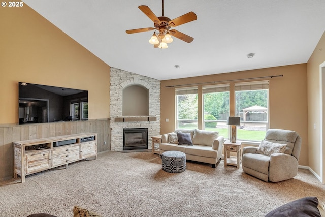 26250 S Milk Creek Cir, Mulino, OR 97042 - carpeted living area with a stone fireplace, ceiling fan, and high vaulted ceiling