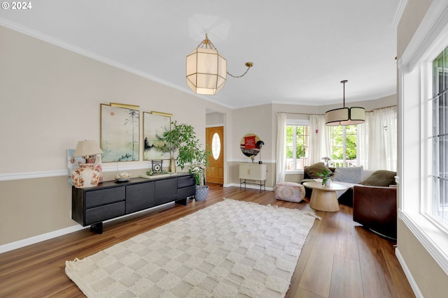 7297 Holly St, Springfield, OR 97478 - sitting room featuring plenty of natural light, wood finished floors, and ornamental molding