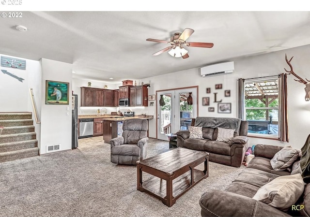 10387 N Mohawk Ave, Portland, OR 97203 - living area with a wall mounted air conditioner, light colored carpet, healthy amount of natural light, and ceiling fan