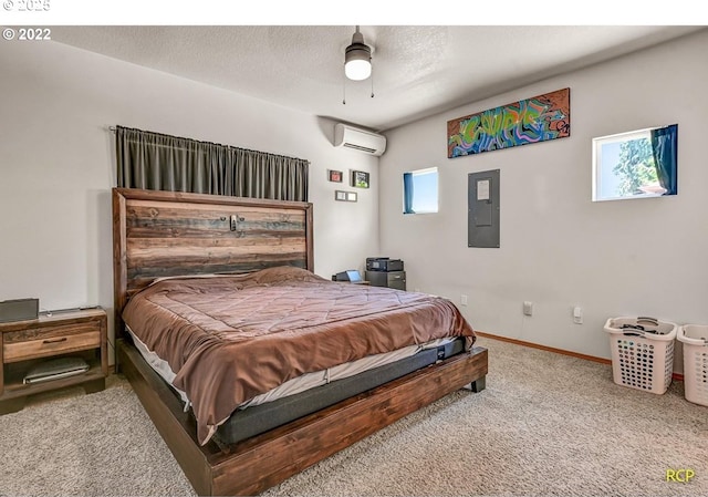 10387 N Mohawk Ave, Portland, OR 97203 - carpeted bedroom featuring a wall unit AC, baseboards, and electric panel