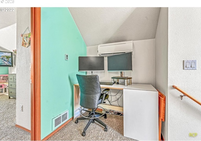 10387 N Mohawk Ave, Portland, OR 97203 - carpeted office space with an AC wall unit, lofted ceiling, a textured ceiling, and a textured wall