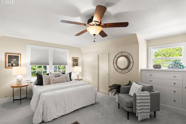 226 N Highland St, Portland, OR 97217 - carpeted bedroom featuring baseboards, multiple windows, and ceiling fan